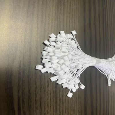 衣類 白いポリエステル セキュリティループ プラスチック タグ 固定器 ユニバーサル